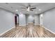 Expansive living area featuring wood flooring, recessed lighting, and easy access to adjacent rooms at 363 Safe Harbor Dr, Dallas, GA 30157