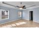 Main bedroom featuring carpet flooring and ample natural light at 363 Safe Harbor Dr, Dallas, GA 30157