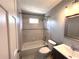 This bathroom features a shower/tub combination, and a vanity sink at 3750 Clubhouse Se Ln, Conyers, GA 30094