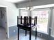 Dining room features large windows and neutral paint, offering a welcoming atmosphere at 3750 Clubhouse Se Ln, Conyers, GA 30094