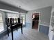 Bright dining room with large windows and new floors provides ample natural light at 3750 Clubhouse Se Ln, Conyers, GA 30094