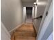 Interior stairway featuring wooden stairs and white risers at 3750 Clubhouse Se Ln, Conyers, GA 30094