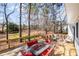 Spacious deck with outdoor dining set and ample seating, perfect for entertaining at 4140 Hillsborough, Cumming, GA 30041