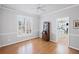 Bright living room with hardwood floors and view to kitchen at 4140 Hillsborough, Cumming, GA 30041