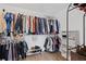 Bright walk-in closet with ample storage space and wood floor at 4140 Hillsborough, Cumming, GA 30041