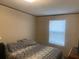 Bedroom with a double bed, natural lighting, and minimalist style at 53 Oakview Dr, Carrollton, GA 30116