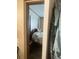 Bedroom featuring a four-poster bed and a dark wood dresser at 53 Oakview Dr, Carrollton, GA 30116