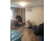 Bedroom with a dresser, television, disorganized decor, and neutral walls at 53 Oakview Dr, Carrollton, GA 30116