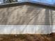 Close-up of the tan siding on a home, highlighting the architectural detail at 53 Oakview Dr, Carrollton, GA 30116