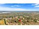 Scenic aerial view of the property's location, surrounded by lush greenery and a lake in the distance at 539 Villa Rosa Rd, Temple, GA 30179