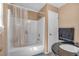 Bathroom showcasing a shower-tub combination with a clear curtain and neutral wall paint at 539 Villa Rosa Rd, Temple, GA 30179