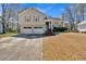 Charming two-story home with a two car garage and a well-manicured front yard at 539 Villa Rosa Rd, Temple, GA 30179