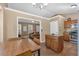 Open kitchen layout with stainless steel appliances seamlessly connecting to the living area at 539 Villa Rosa Rd, Temple, GA 30179
