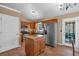 Kitchen featuring stainless steel refrigerator, tile floors and breakfast bar at 539 Villa Rosa Rd, Temple, GA 30179