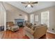 Comfortable living room with a fireplace and hardwood floors, perfect for relaxation at 539 Villa Rosa Rd, Temple, GA 30179
