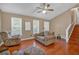 Bright living room with hardwood floors and windows at 539 Villa Rosa Rd, Temple, GA 30179