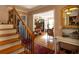Inviting entryway boasts hardwood floors, an elegant staircase, and views into the adjacent rooms at 959 Hampton Nw Trl, Lilburn, GA 30047