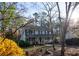 Attractive two-story home featuring a welcoming front porch and a picturesque setting at 959 Hampton Nw Trl, Lilburn, GA 30047