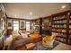 Inviting living room features custom bookshelves, a fireplace, and comfortable seating at 959 Hampton Nw Trl, Lilburn, GA 30047