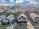 Charming home nestled in a vibrant community, aerial view highlights surrounding greenery and neighborhood charm at 2478 Verbena Nw Cir, Atlanta, GA 30314
