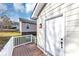 Back porch features a secure door and a set of stairs at 2478 Verbena Nw Cir, Atlanta, GA 30314