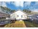 Backyard featuring a trampoline, white siding, and blue skies at 2478 Verbena Nw Cir, Atlanta, GA 30314