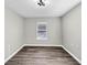 Spacious bedroom featuring modern flooring, fresh paint, and natural lighting at 2478 Verbena Nw Cir, Atlanta, GA 30314