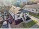 Charming two-story home boasts a welcoming front porch, new landscaping and convenient driveway at 2478 Verbena Nw Cir, Atlanta, GA 30314