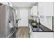 Modern kitchen featuring stainless steel appliances and granite countertops at 2478 Verbena Nw Cir, Atlanta, GA 30314