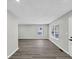 Spacious room with hardwood flooring, light paint, and a window at 2478 Verbena Nw Cir, Atlanta, GA 30314