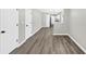 Inviting, sun-filled interior showcasing neutral walls and stylish light hardwood floors at 2478 Verbena Nw Cir, Atlanta, GA 30314