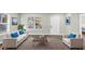 Bright living room with modern decor, large windows and stylish furniture at 2478 Verbena Nw Cir, Atlanta, GA 30314