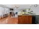 Spacious kitchen that opens to the living area with modern appliances and granite countertops at 2845 Englewood Dr, Cumming, GA 30040