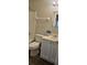 Practical bathroom featuring vanity storage and a shower-tub combination at 4858 Westridge Dr, Norcross, GA 30093