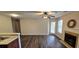Bright living room featuring a fireplace, hardwood floors, and a patio door at 4858 Westridge Dr, Norcross, GA 30093
