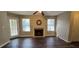 Inviting living room features a fireplace and wood-look flooring at 4858 Westridge Dr, Norcross, GA 30093