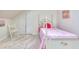 Charming bedroom features a vintage-style bed and soft, neutral decor at 684 Oak Moss Dr, Lawrenceville, GA 30043