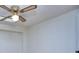 Ceiling fan with decorative light fixture on a smooth, white ceiling at 684 Oak Moss Dr, Lawrenceville, GA 30043