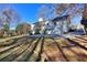 Beautiful two-story house with white exterior and an ample driveway at 684 Oak Moss Dr, Lawrenceville, GA 30043