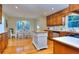 Traditional eat-in kitchen with center island and stainless steel appliances at 684 Oak Moss Dr, Lawrenceville, GA 30043
