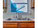 Close up of the stainless steel sink and faucet of the kitchen at 684 Oak Moss Dr, Lawrenceville, GA 30043