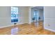 Bright room with hardwood floors and large window at 684 Oak Moss Dr, Lawrenceville, GA 30043