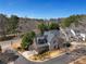 Aerial view showcases a home with a large backyard and a private wooded lot in a quiet neighborhood at 2620 Middle Coray Cir, Marietta, GA 30066