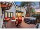 An angle view of the outdoor patio with hot tub, fireplace, seating and wooden accents at 2620 Middle Coray Cir, Marietta, GA 30066