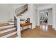 Elegant foyer showcasing hardwood floors, staircase with iron railings, and view of the living space at 2620 Middle Coray Cir, Marietta, GA 30066