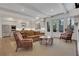 Spacious living room area with an open layout, fireplace, and access to the outdoors at 2620 Middle Coray Cir, Marietta, GA 30066