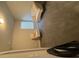 Comfortable bonus room with neutral carpeting and chair at 8325 Loch Lomand Ln, Winston, GA 30187