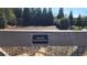 Dennis Hill Memorial Dog Park, a wooded area with gravel for dogs at 188 Foxtail Rd, Woodstock, GA 30188
