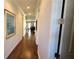 Hallway with hardwood floors and white molding at 188 Foxtail Rd, Woodstock, GA 30188