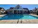 Community swimming pool with lounge chairs at 188 Foxtail Rd, Woodstock, GA 30188